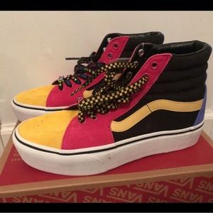 Multi colored platform high top vans